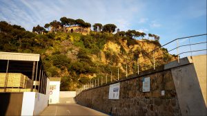 Entrance to the small hidden harbor beach in Blanes